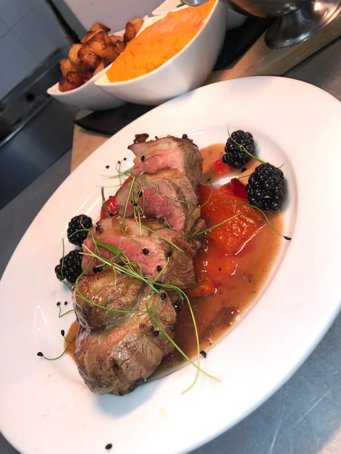 Roasted meat with blackberries