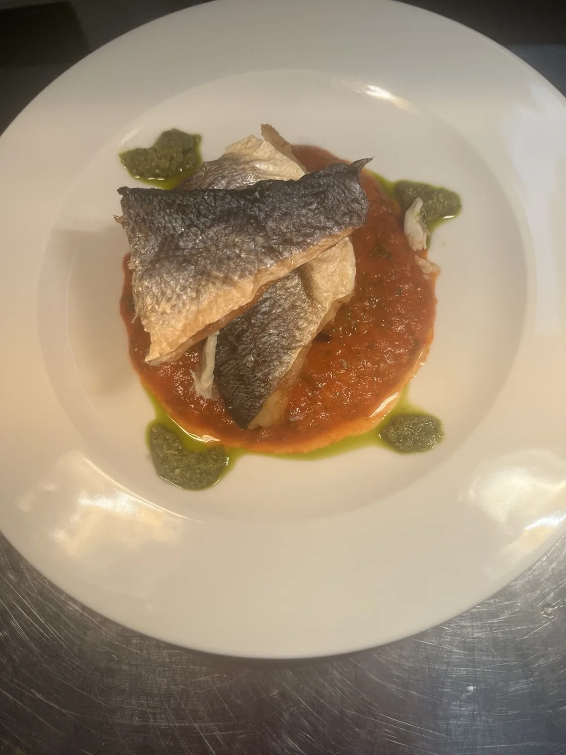 Fish with tomato and herbs