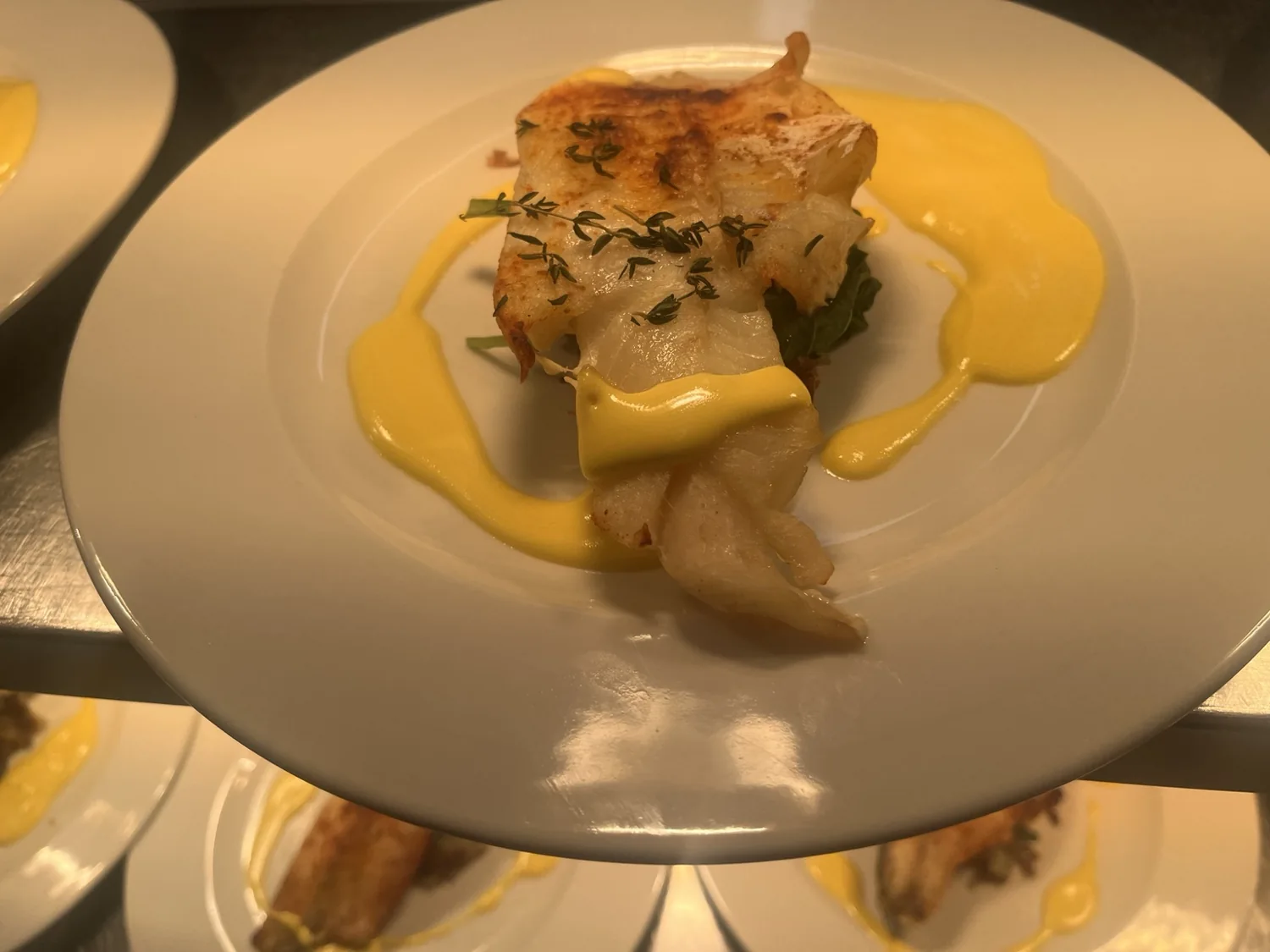 Fish with golden sauce